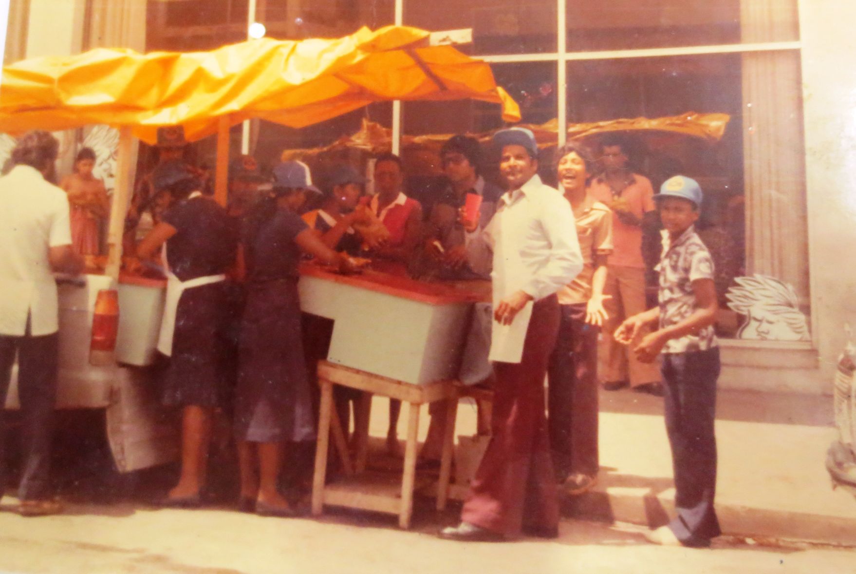 Mustapha Ali at one of his doubles stalls in San Fernando.JPG